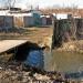 Пешеходный мостик над ручьём в городе Мариуполь