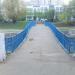 Пешеходный мост через пруд-регулятор в городе Москва