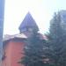 Башенка с флюгером в городе Москва
