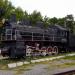 Old steam locomotive with museum in a carriage. in Melitopol city
