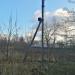 Заброшенная опора ЛЭП с прожектором в городе Марьина Горка