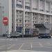 Фонарный столб с уличными часами в городе Москва