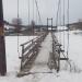 Пешеходный подвесной мост через реку Сим в городе Миньяр