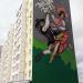 Фасад, расписанный польскими художниками: польские танцы, гуцульский танец в городе Магнитогорск