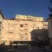 Soviet style red building in Tirana city
