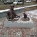 Скульптура «Комунальник у колодязі та котик» в місті Полтава
