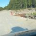 Размываемый участок дороги в городе Полярные Зори