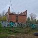 Недостроенный трехэтажный кирпичный дом в городе Долгопрудный