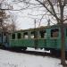 Узкоколейный тепловоз с вагоном в городе Барвенково
