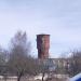 Красная водонапорная башня в городе Выборг