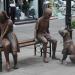 Sculpture of resting children with pets (en)