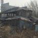 Заброшенный дом с мезонином в городе Новосибирск