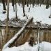 Самодельный пешеходный мост через реку Будайку в городе Москва
