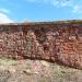 Руины каменной стены XIV в. в городе Великий Новгород