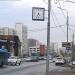 Опора освещения с уличными часами в городе Москва