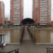 Пешеходный мост через пруд на реке Теребенке в городе Чехов