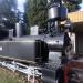 A steam locomotive and several cars in Podgorica city