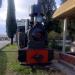 A steam locomotive and several cars in Podgorica city
