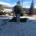 Statue of women on square in front of Old Town in Budva city