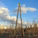 Старая деревянная опора ЛЭП в городе Москва