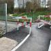 Fußgängerüberweg über Bahngleisen. in Stadt Traunstein