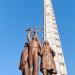 A statue of a worker, a peasant woman and a 