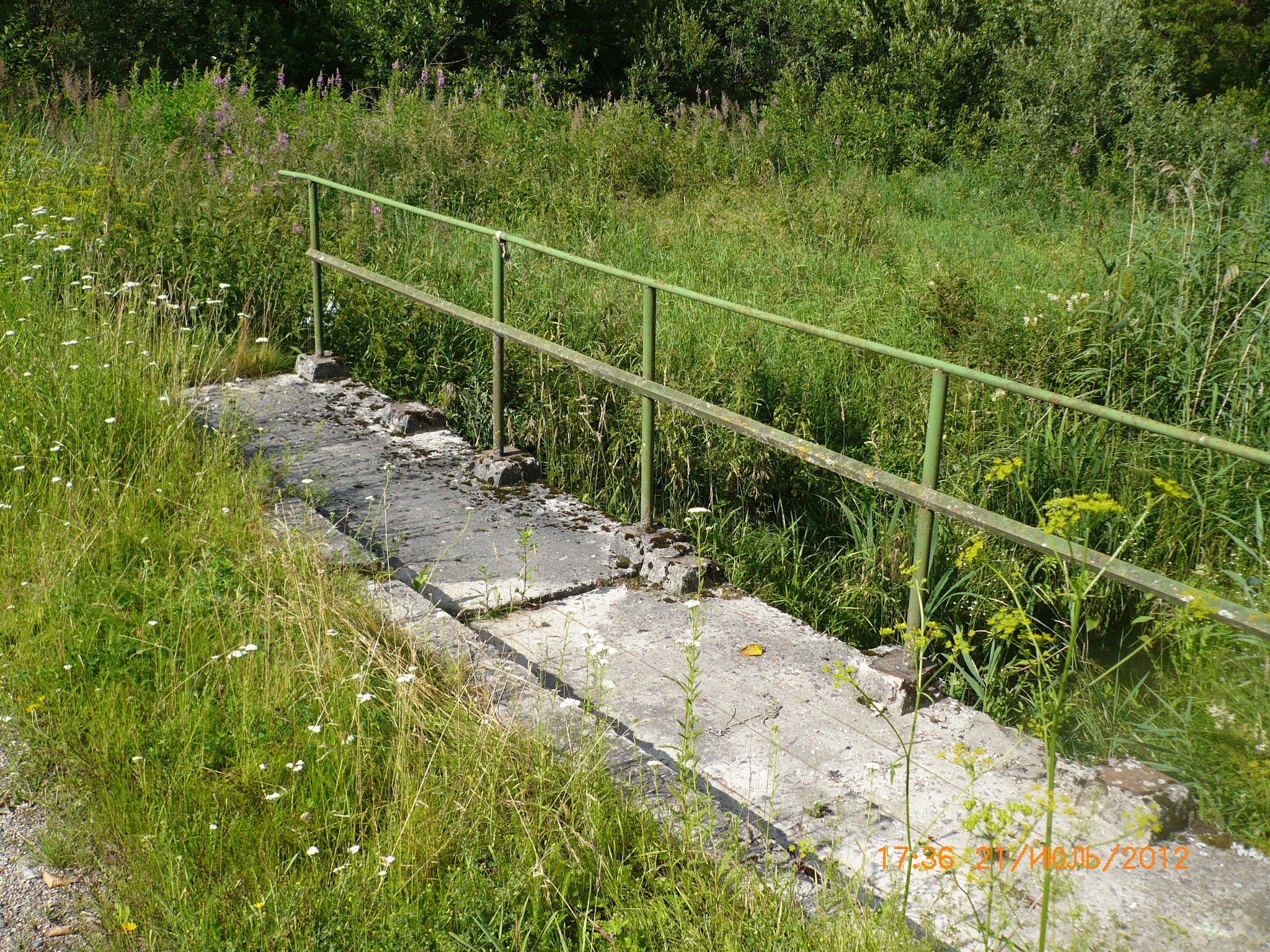 Bridge across drainage channel