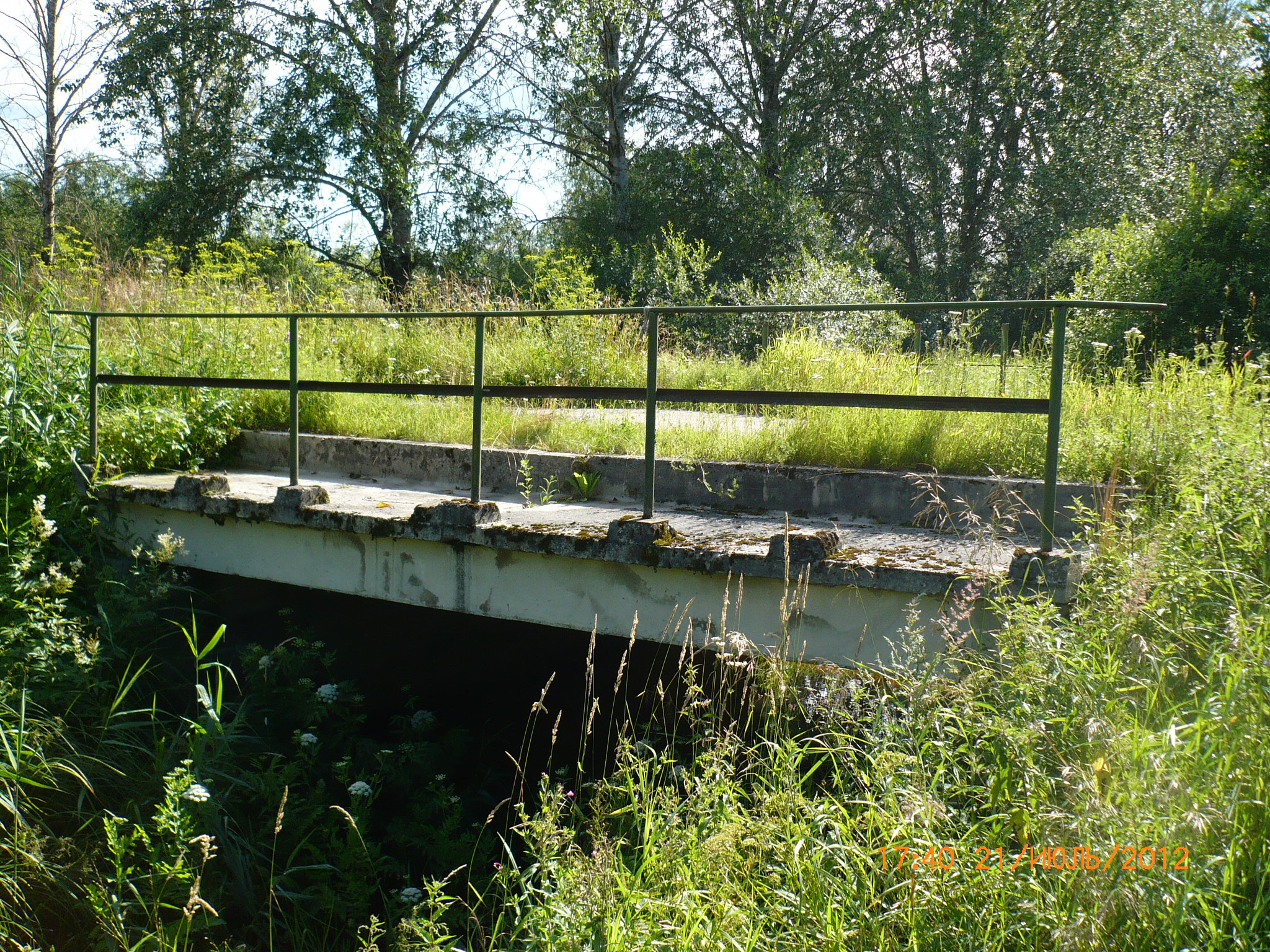 Bridge across drainage channel